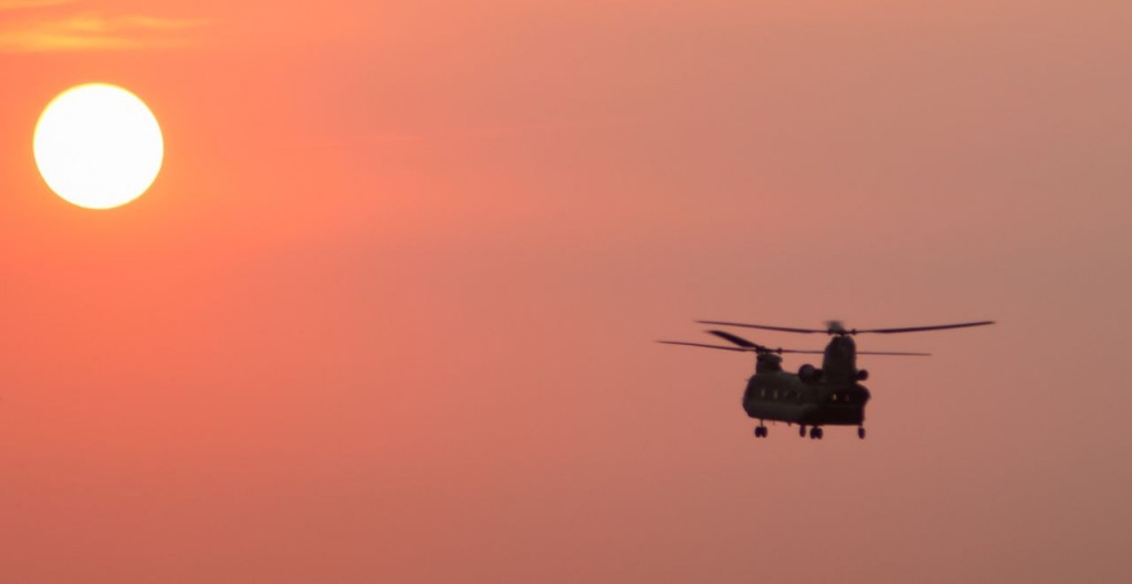 CH-47 Over Joe Pool Spillway at Sunset.